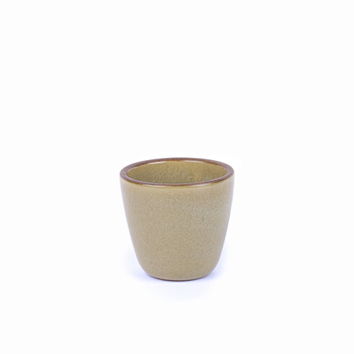A short cup that tapers out to get wider at the top in a reflective dappled grey-green