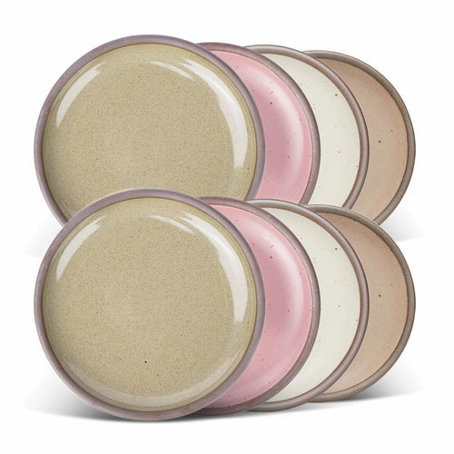 8 medium sized ceramic plates in a dusty mauve pink, reflective dappled grey-green, warm off-white and pale warm brown colors featuring iron speckles and an unglazed rim.