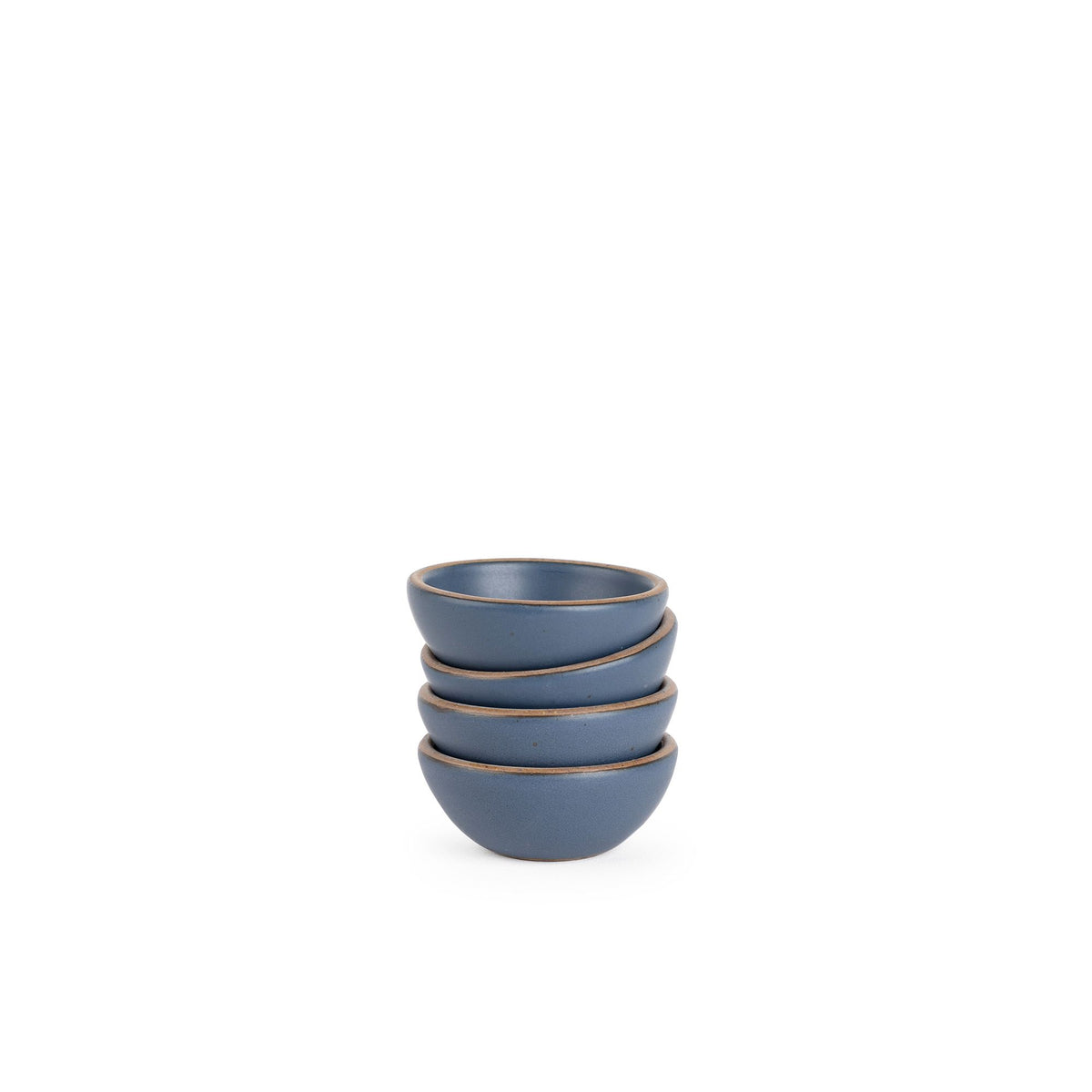 A stack of 4 tiny rounded ceramic bowls in a cool medium blue color featuring iron speckles and an unglazed rim