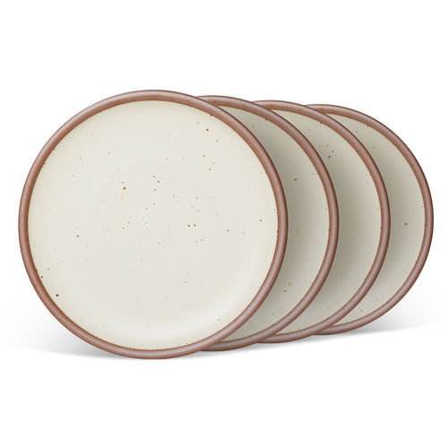 4 dinner sized ceramic plates in a warm, tan-toned, off-white color featuring iron speckles and an unglazed rim