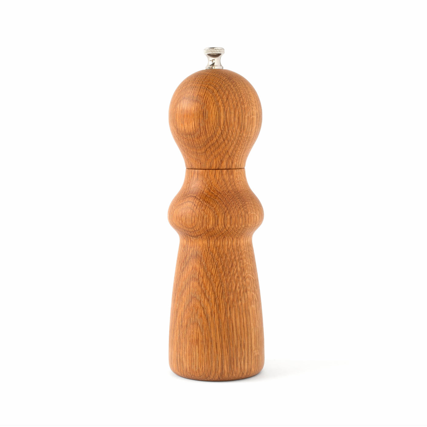 Simple salt mill made of oak with a curved cylinder body and metal piece at the top.