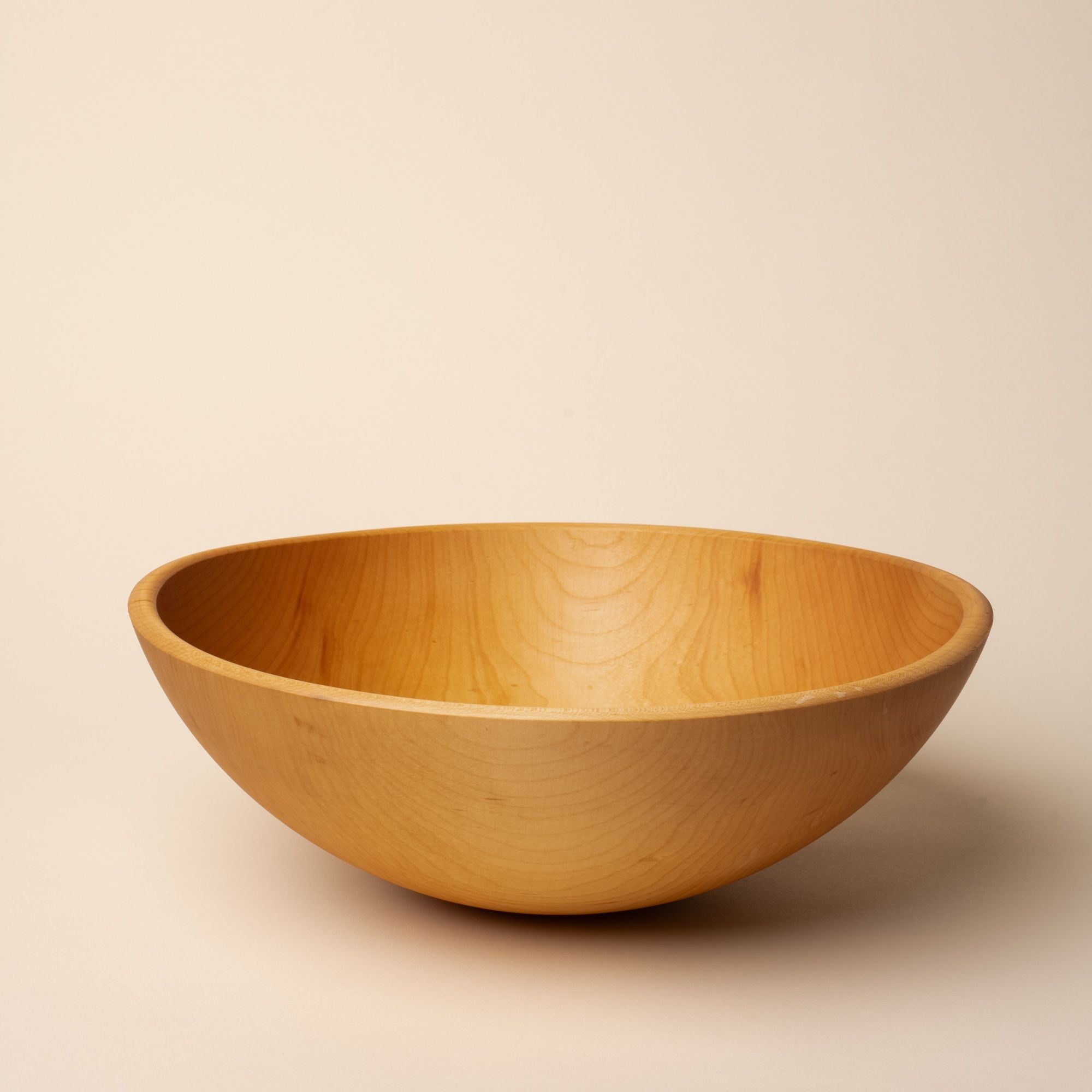 A large maple wood bowl