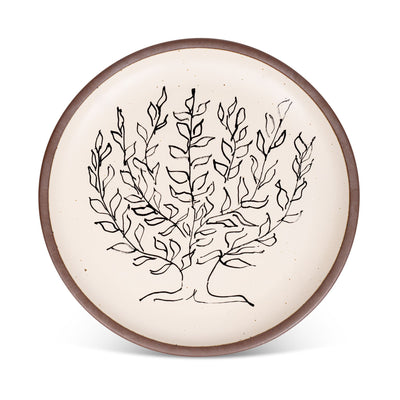 A large serving platter in a warm off-white color with unglazed rim with a black decal of the artwork, Le Platane, from Henri Matisse.