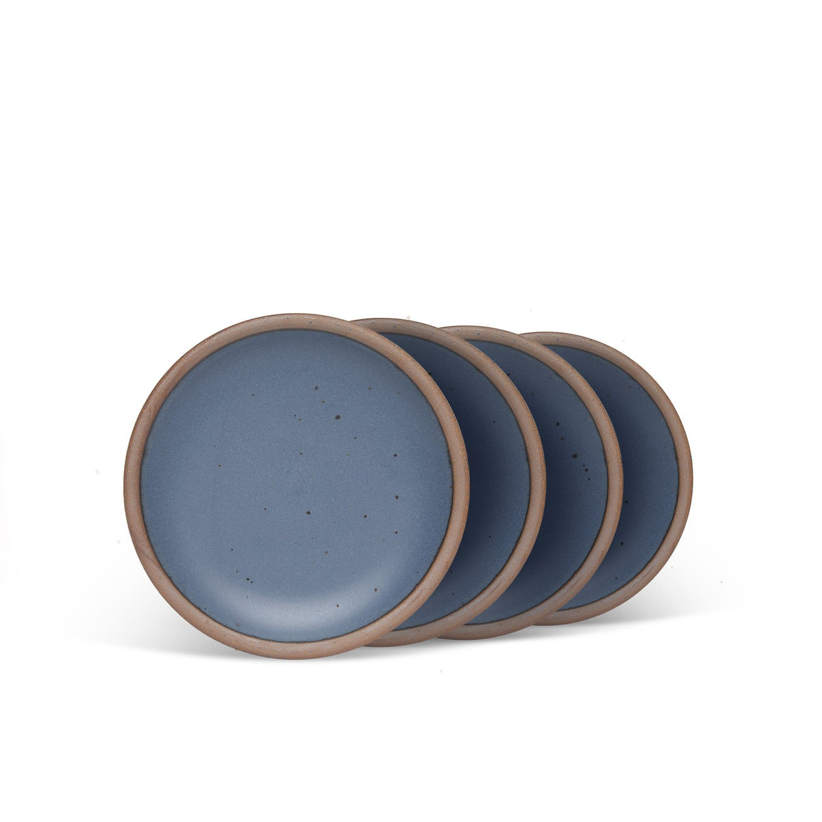 4 dessert sized ceramic plates in a cool, medium blue color featuring iron speckles and an unglazed rim.