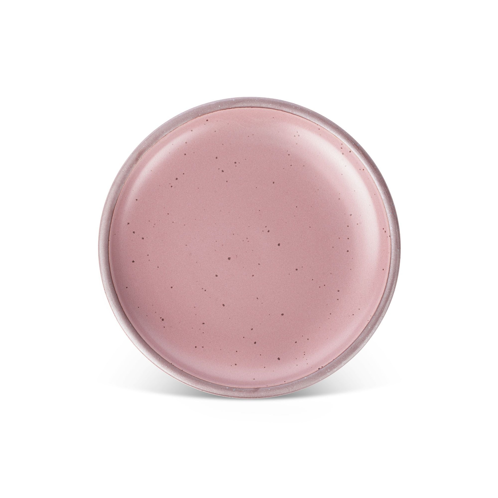 A dinner sized ceramic plate in a dusty mauve pink color featuring iron speckles and an unglazed rim