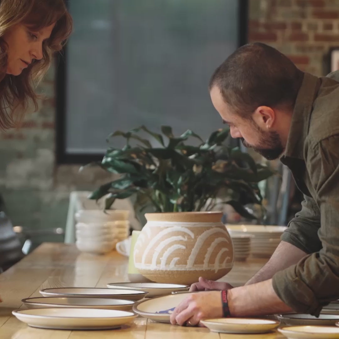 A video of Nicole and Alex looking at pieces from The Matisse Collection in the office.