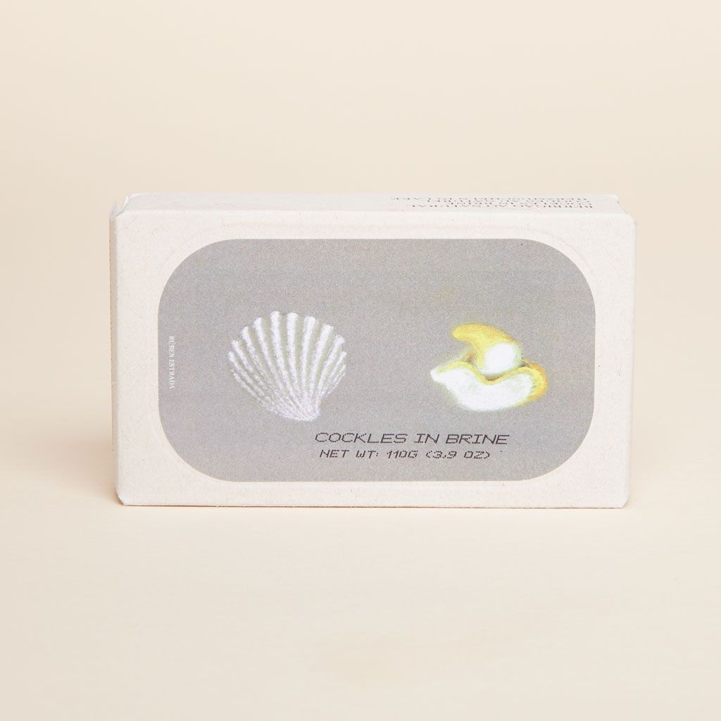 Brown rectangular box with illustrations of a shell and two cockles
