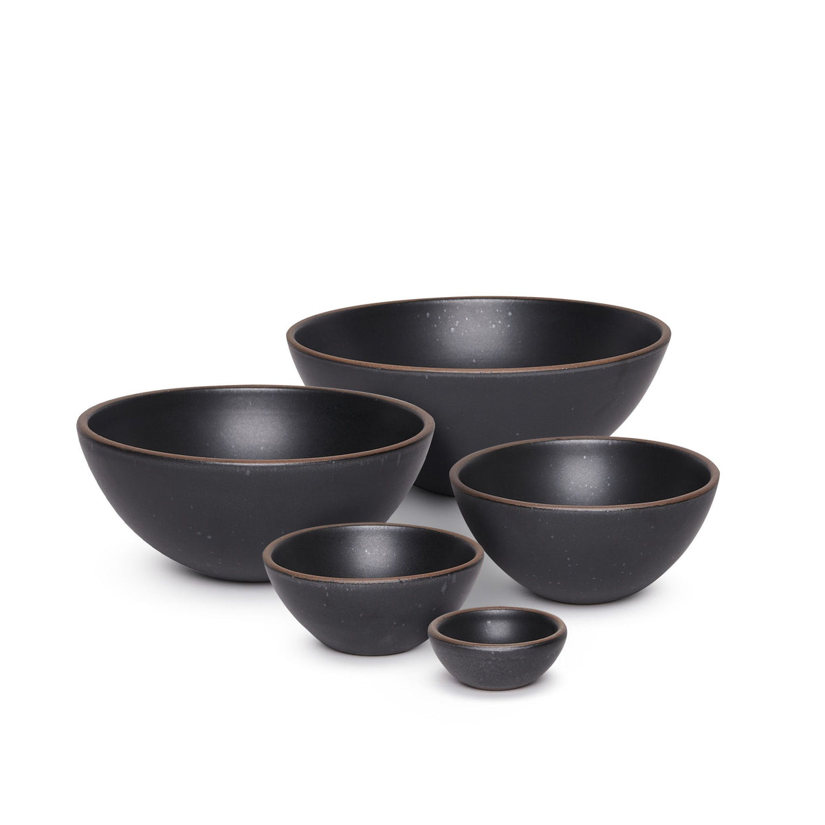 A bitty bowl, ice cream bowl, soup bowl, popcorn bowl, and mixing bowl paired together in a graphite black color featuring iron speckles